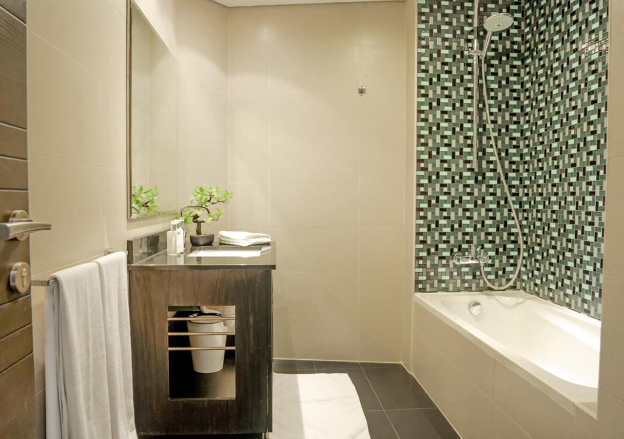 Nasma Luxury Stays - Cayan Tower Dubai Bagian luar foto