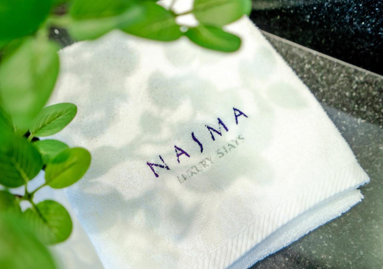 Nasma Luxury Stays - Cayan Tower Dubai Bagian luar foto