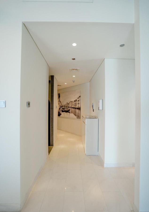 Nasma Luxury Stays - Cayan Tower Dubai Bagian luar foto